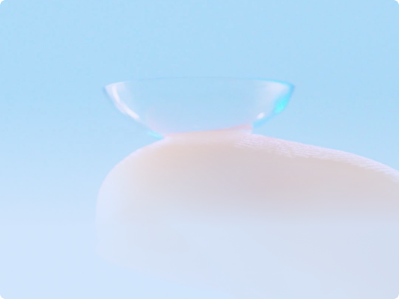 Contact lens on a fingertip