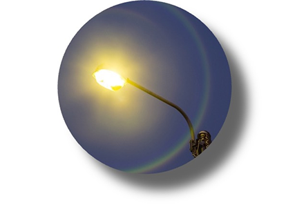 A blurry circular halo effect around lights, illustrating minimal halo disturbance with PanOptix Pro