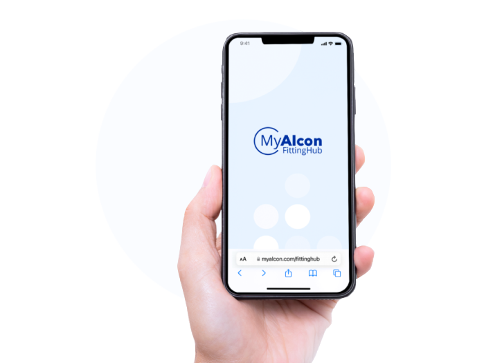 A hand holding a smartphone displaying the MyAlcon FittingHub website on the screen. The background is white with circular design elements.