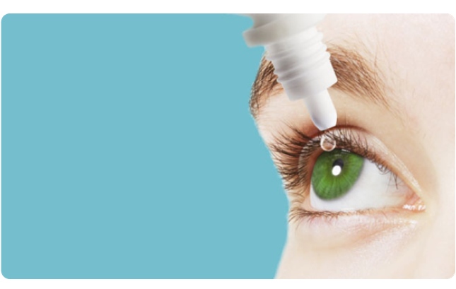 Close up of eye and eye drops