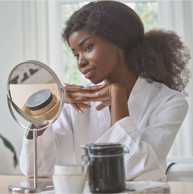 Woman looking in the mirror