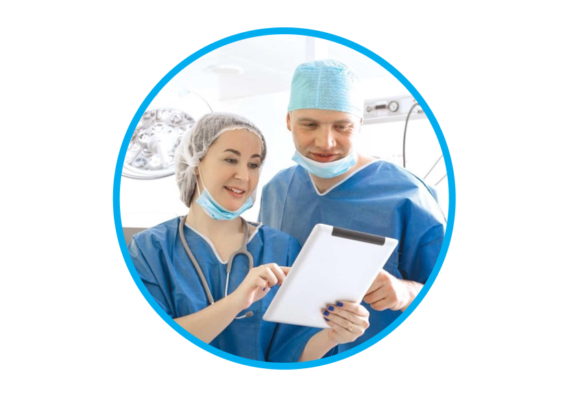 An image of a man and a woman wearing scrubs while interacting with a tablet.