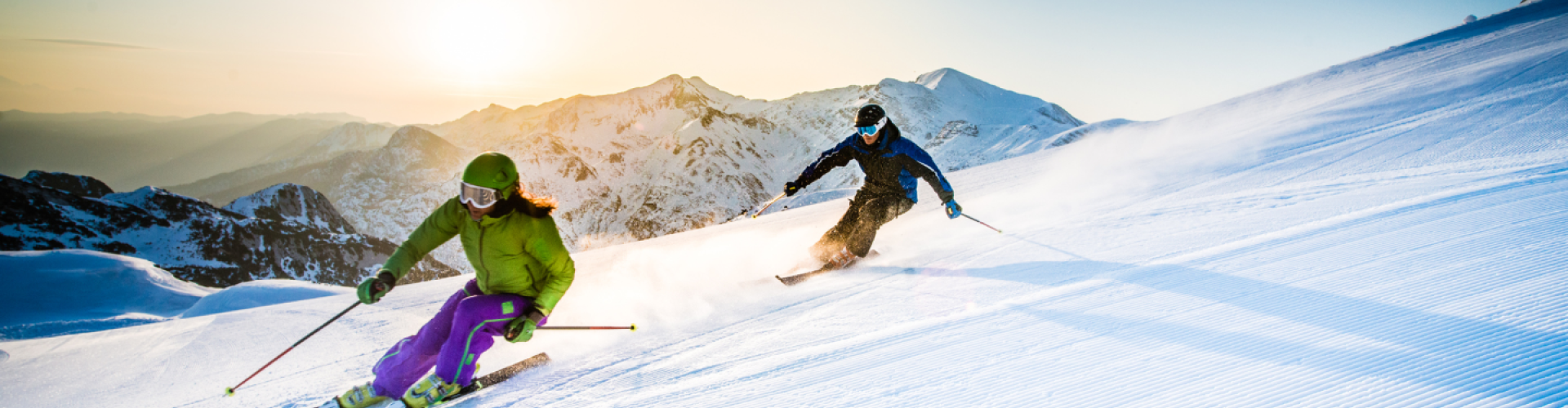 Two people skiing
