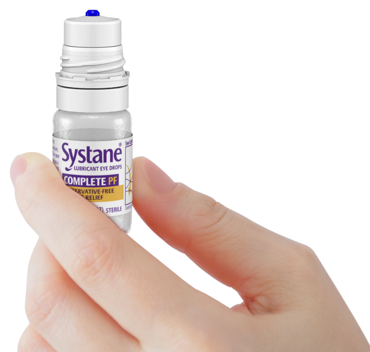 hand holding ergonomic multi-dose bottle of Systane Complete Preservative-Free