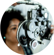 woman experiencing in-office eye examination