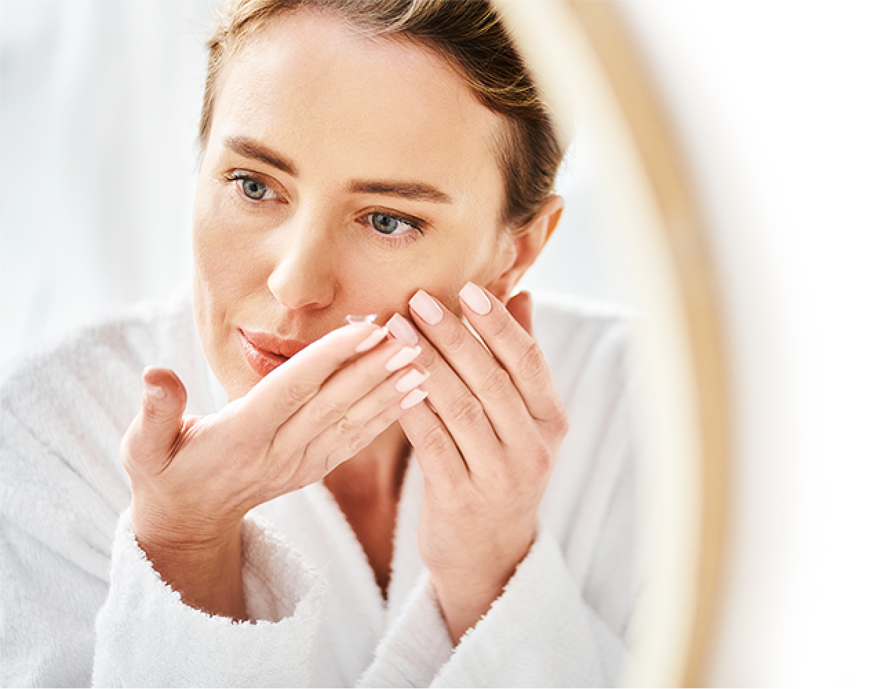 Woman putting in a contact lens