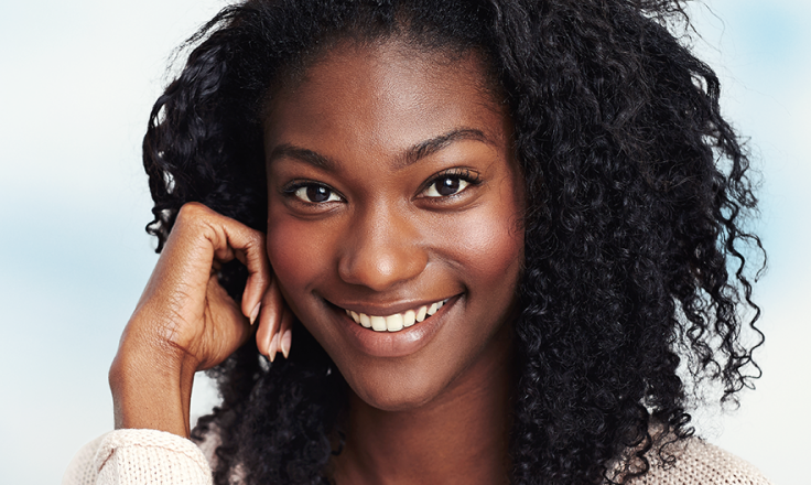 Smiling woman with long hair
